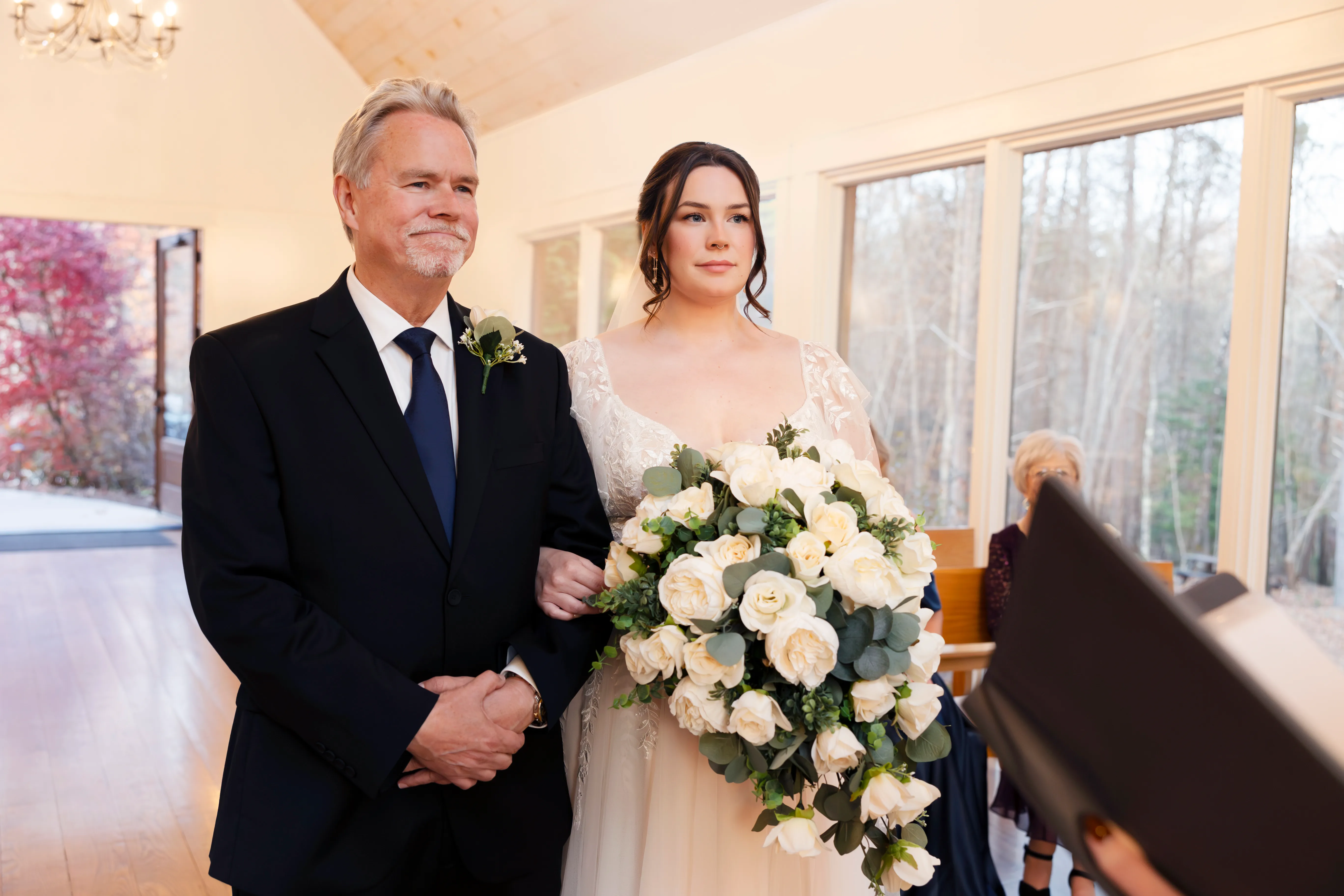 Bride and father candid moment during the processional at Juliette Chapel