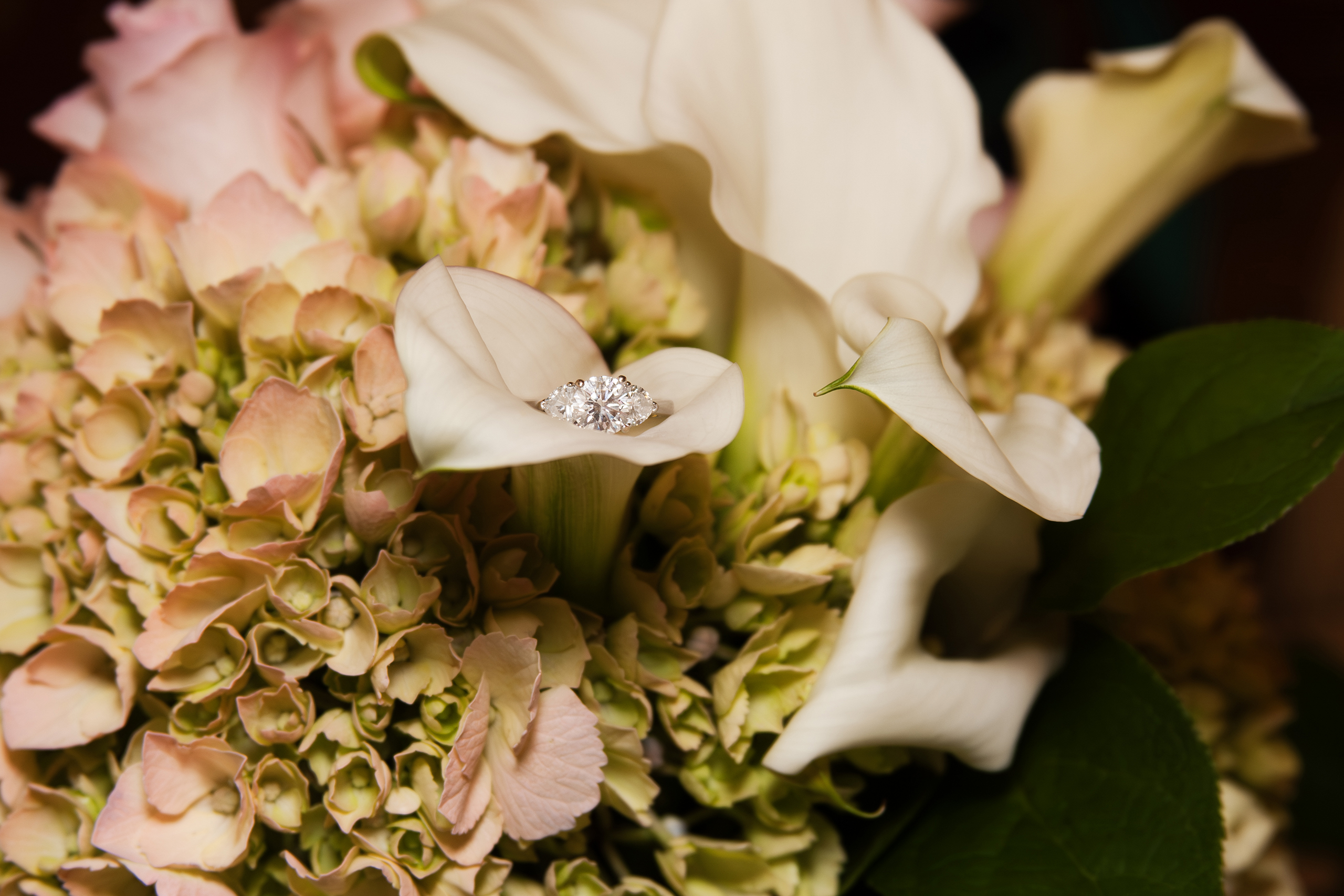 Wedding ring and bouquet detail